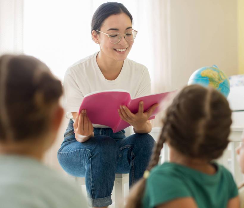 front-view-woman-reading-something-her-students