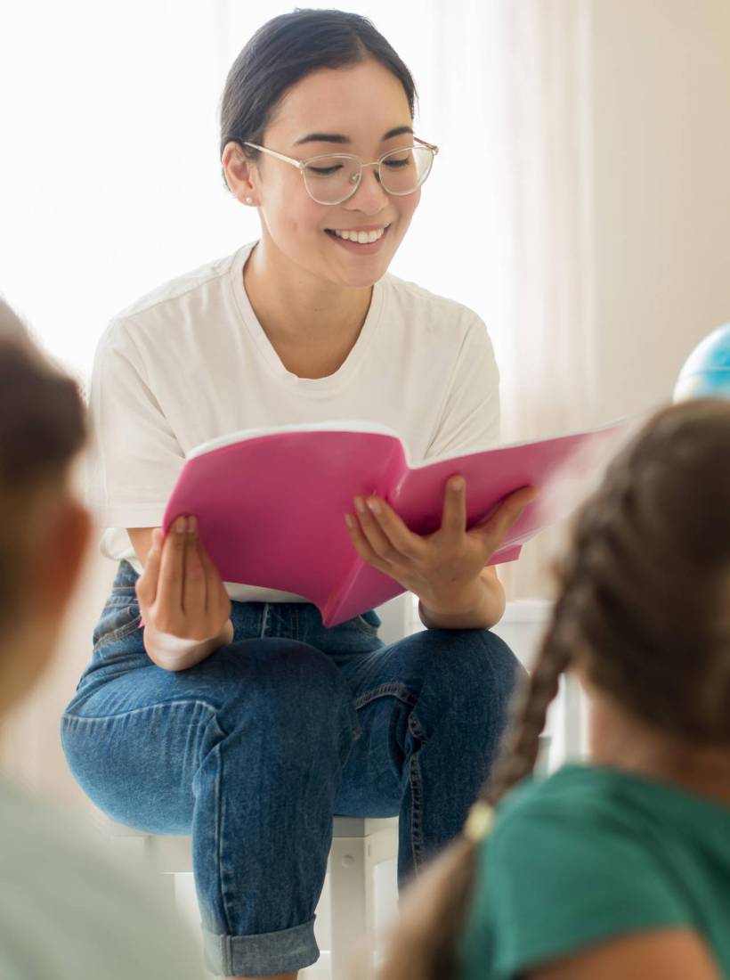 front-view-woman-reading-something-her-students